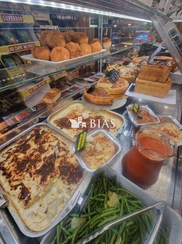 Vente rôtisserie traiteur rue commerçante de Paris