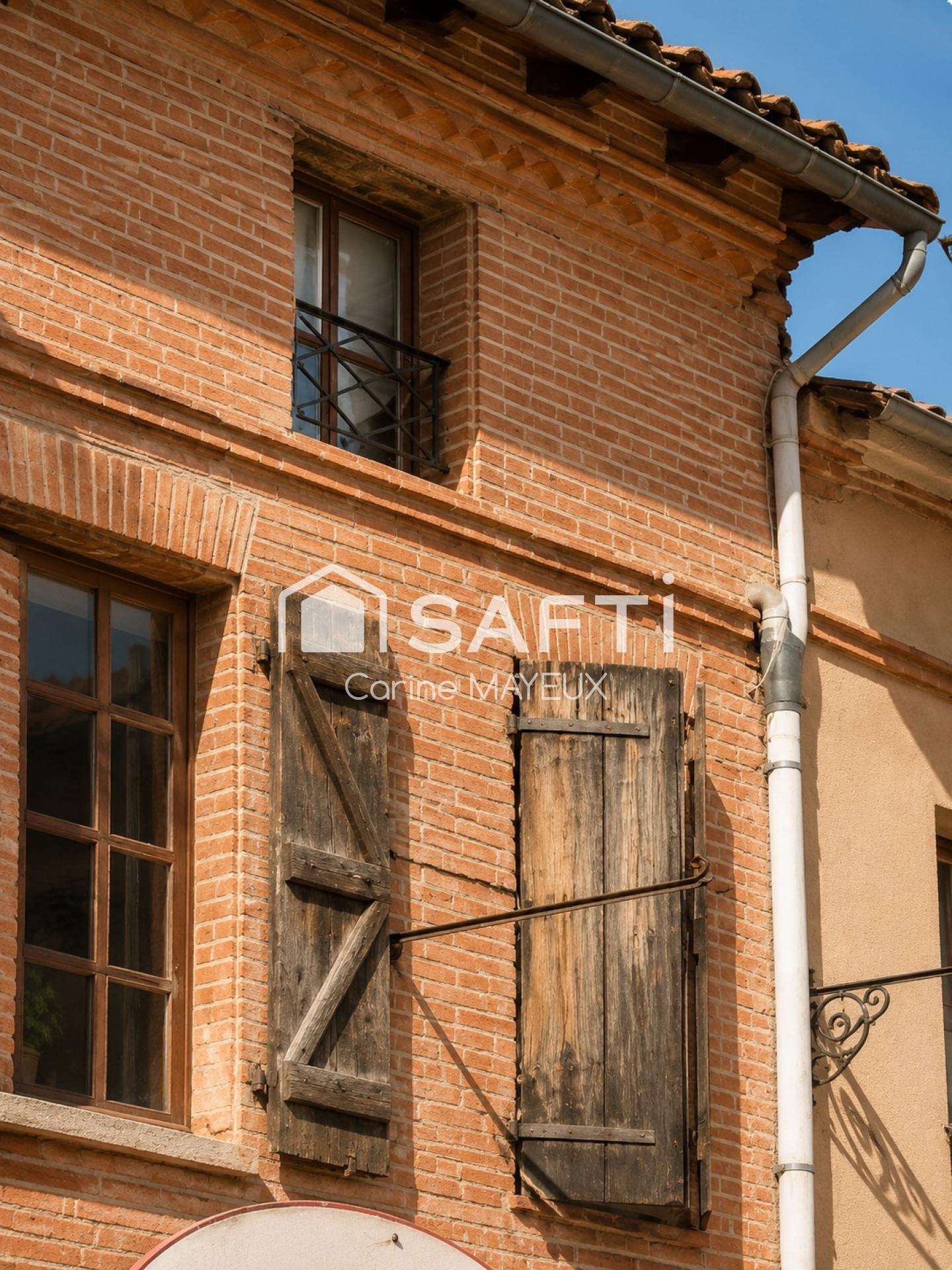 Immeuble commercial avec logement Fronton centre 