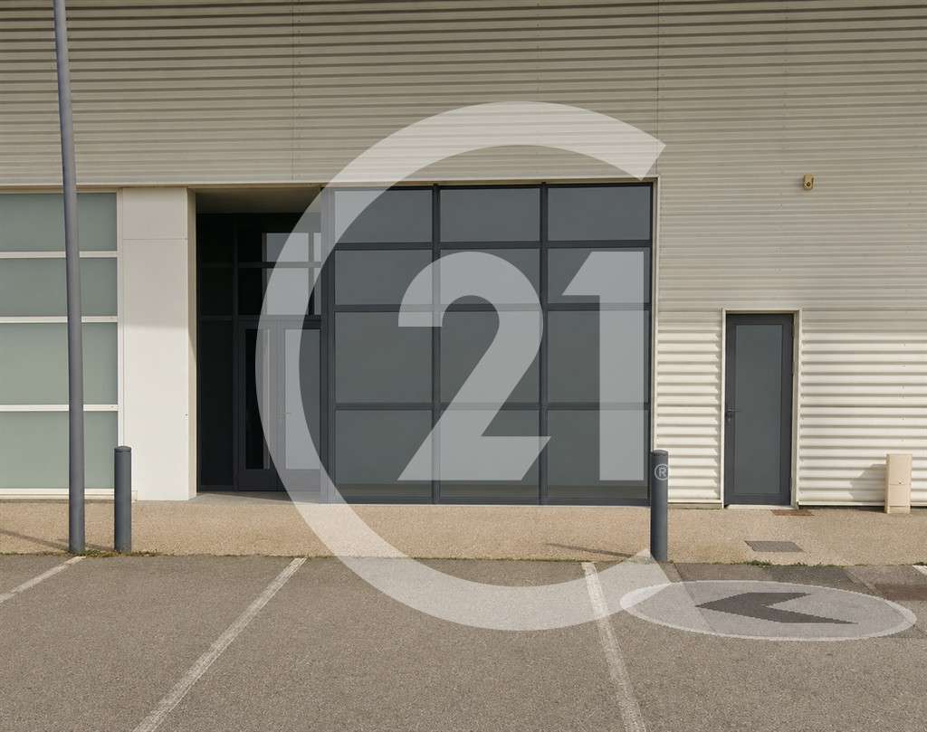 Loue local de 140m² en zc Portes les Valence