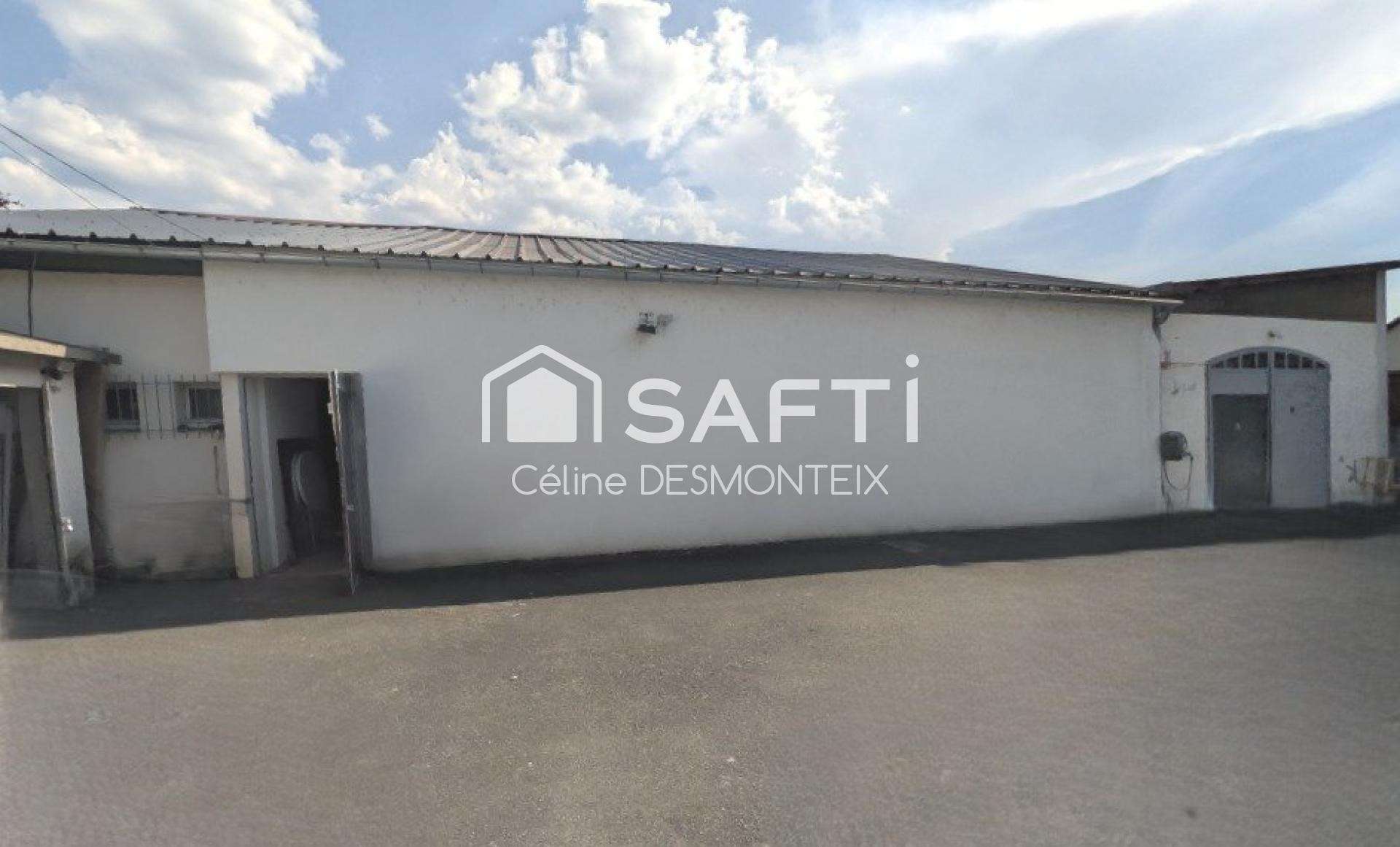 Vente local stockage 390m² et maison à Valentigney