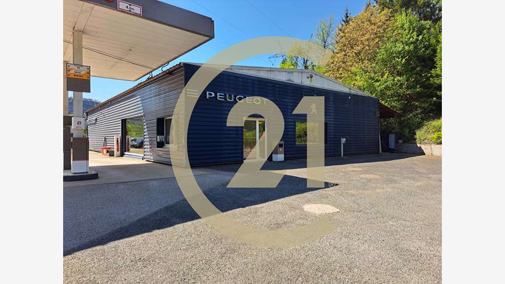 A vendre garage auto avec murs 400m² proche Lons