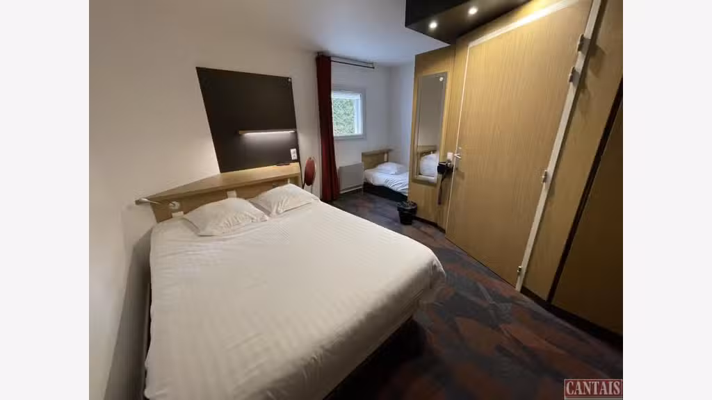 Vente hôtel bureau sur axe Epinal Metz