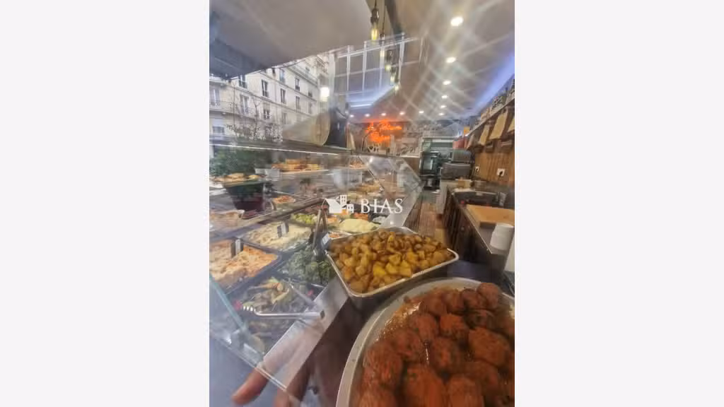 Vente rôtisserie traiteur rue commerçante de Paris