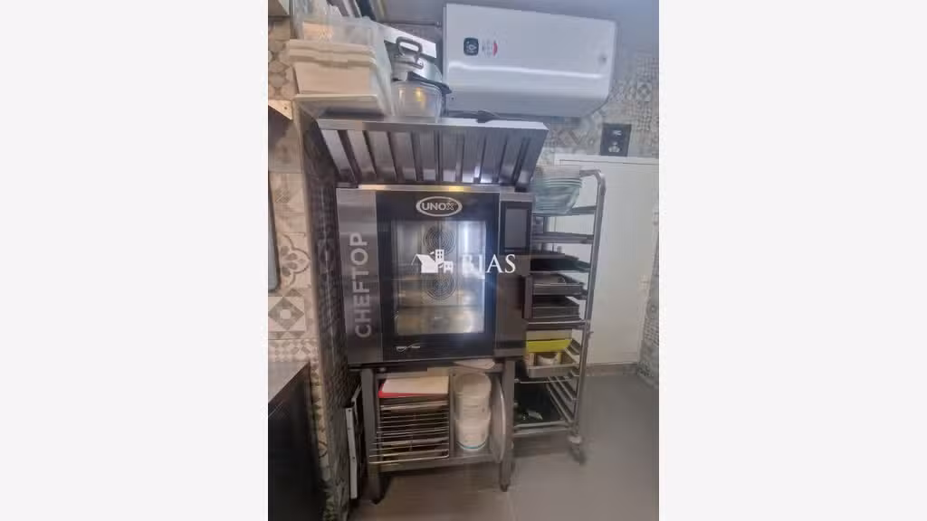 Vente rôtisserie traiteur rue commerçante de Paris