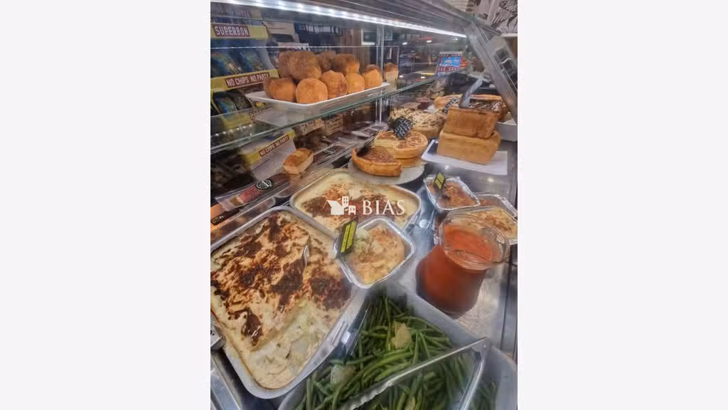Vente rôtisserie traiteur rue commerçante de Paris