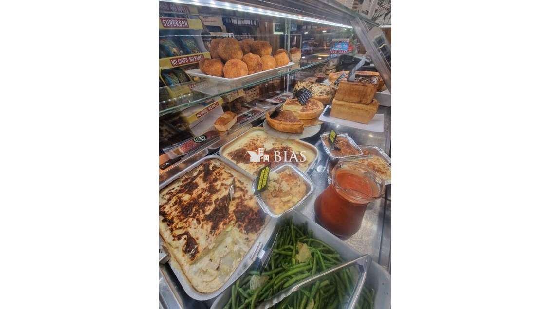 Vente rôtisserie traiteur rue commerçante de Paris