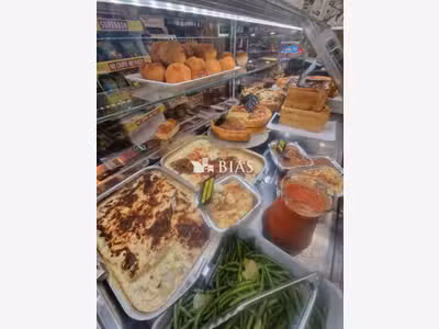 Vente rôtisserie traiteur rue commerçante de Paris