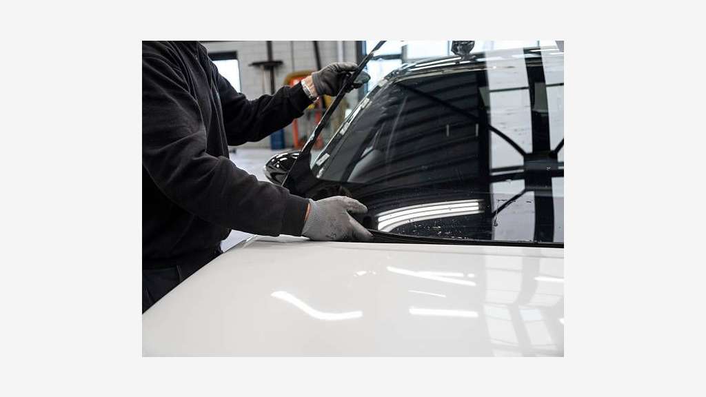 AV centre remplacement pare-brise sous enseigne 47