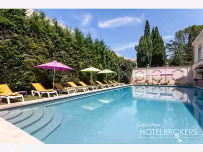 Vente boutique hôtel à pieds du centre historique