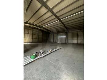 A louer entrepôt 600m² à Créhen D768