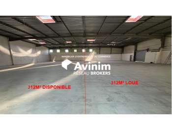 A louer local 825m² à Lescar Zone Commerciale
