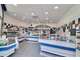 AV poissonnerie 90m² empl N°1 à Morestel centre