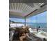 AV restaurant face à la mer avec sa plage privée