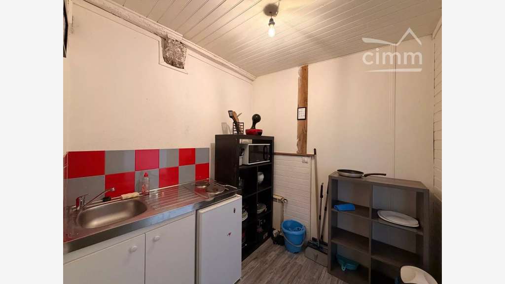 Immeuble de rapport avec local commercial loué  