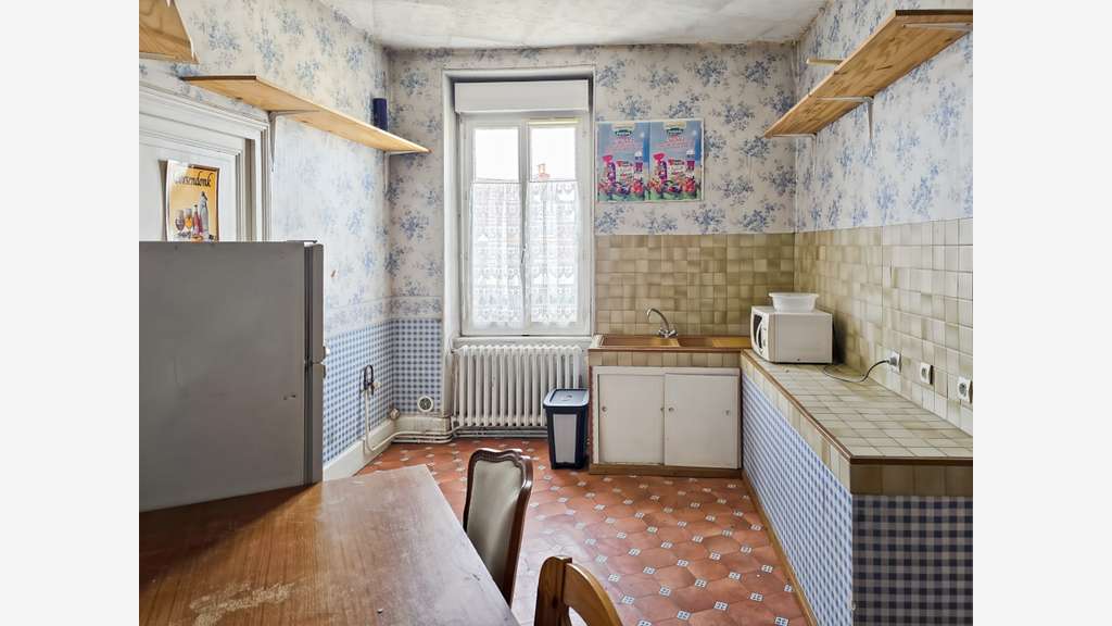 Immeuble de rapport commerce loué 263m²  à Nevers