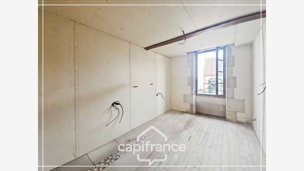 Immeuble et maison avec fort potentiel au cœur de