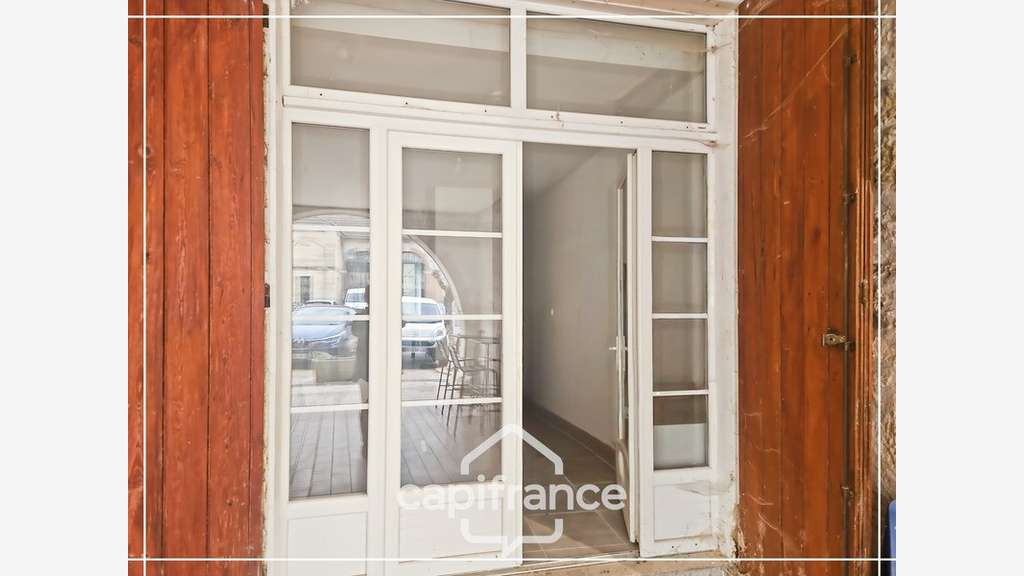 Immeuble et maison avec fort potentiel au cœur de
