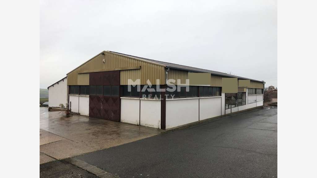 Vente local d'activité 555m² sur 2715m² à Coise