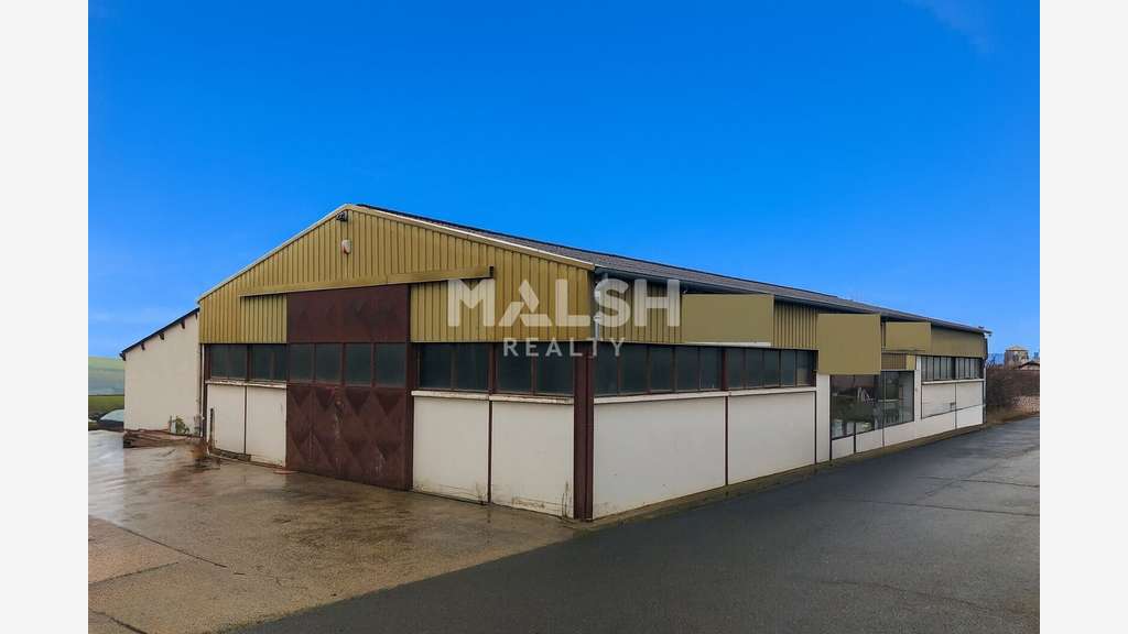 Vente local d'activité 555m² sur 2715m² à Coise