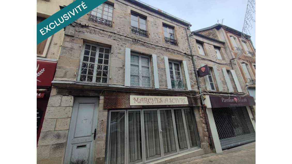 Immeuble à rénover avec beau potentiel