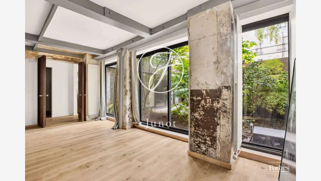 AV local profession libérale 210m² à Paris 75009