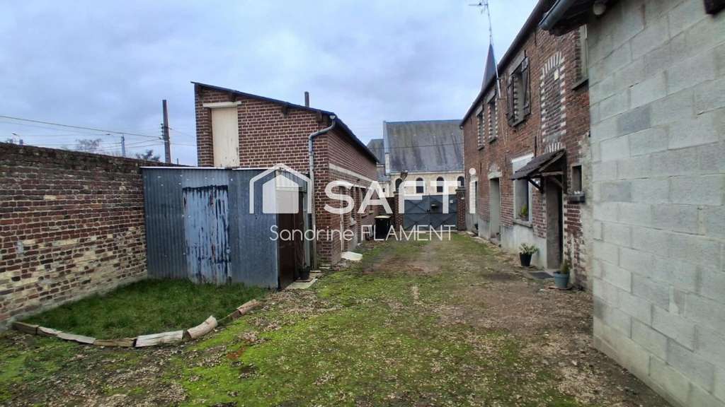 Local garage à vendre avec maison à Sinceny