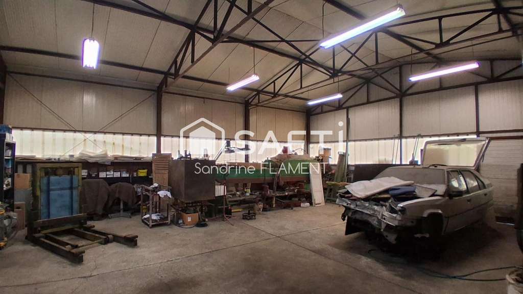 Local garage à vendre avec maison à Sinceny