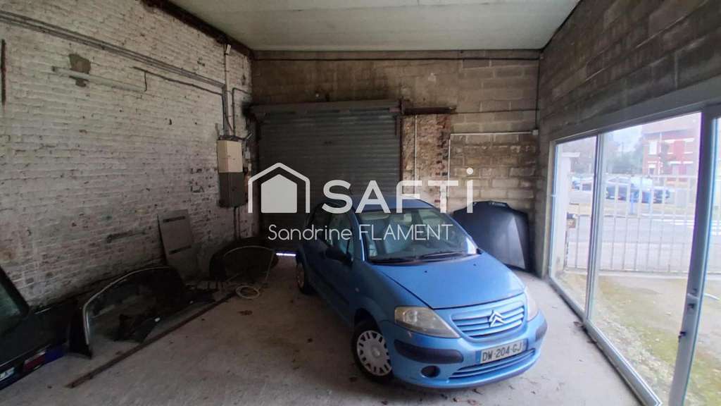 Local garage à vendre avec maison à Sinceny