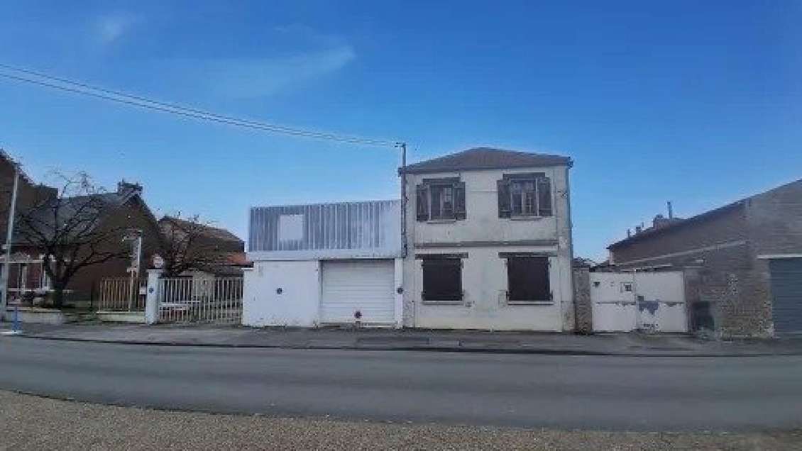 Local garage à vendre avec maison à Sinceny