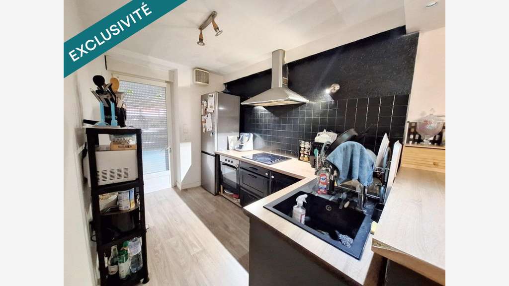 Immeuble de rapport avec bar PMU à Terrasson