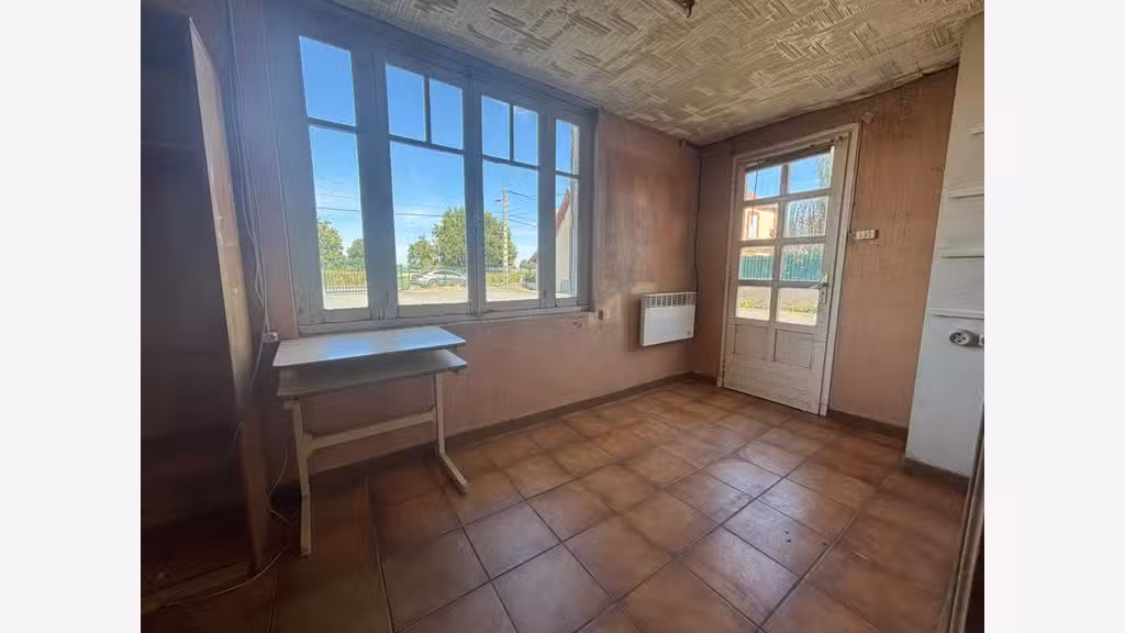 Vente ancien garage avec magasin à Bouchaud 
