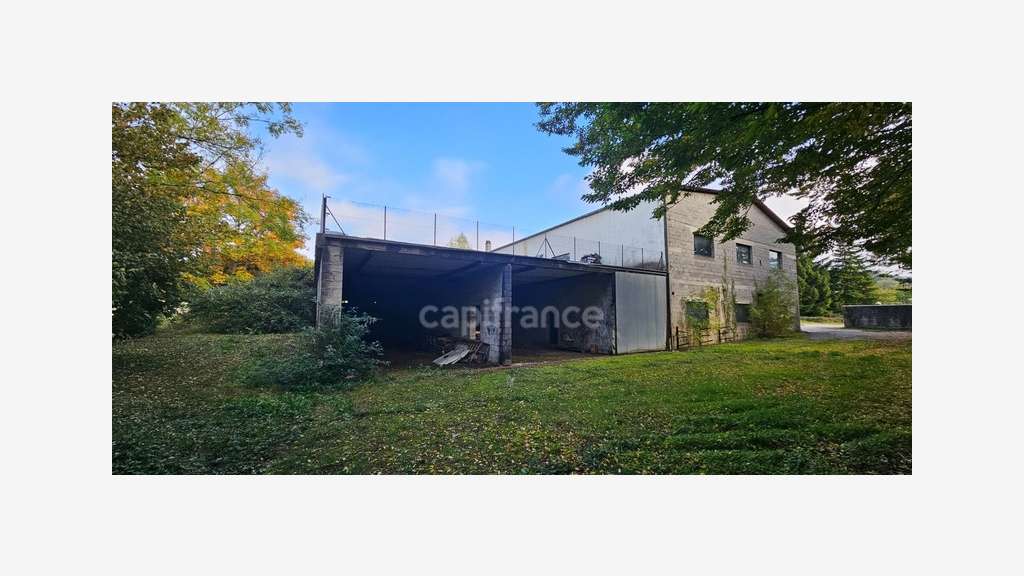 AV bâtiment pro 1 300m² + garages Lons le Saunier