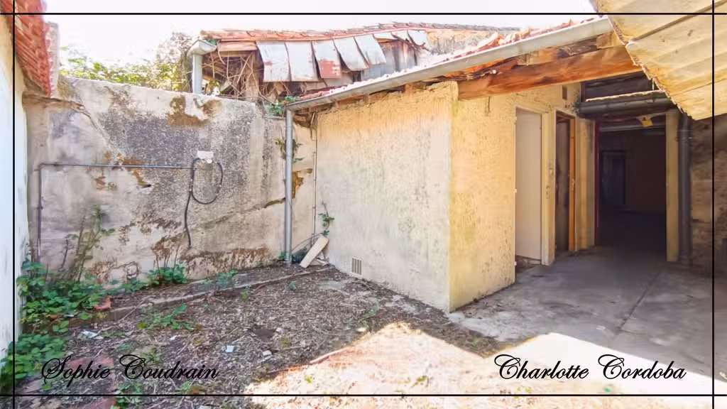 Vente garage avec cour et fort potentiel Miramont