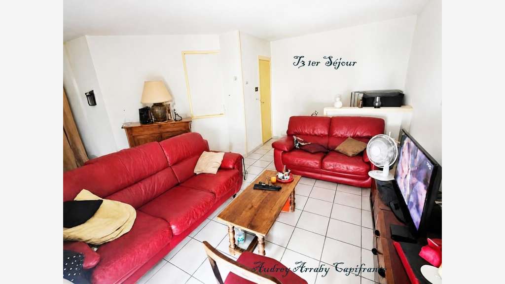 Immeuble de 3 appartements avec garages et jardins