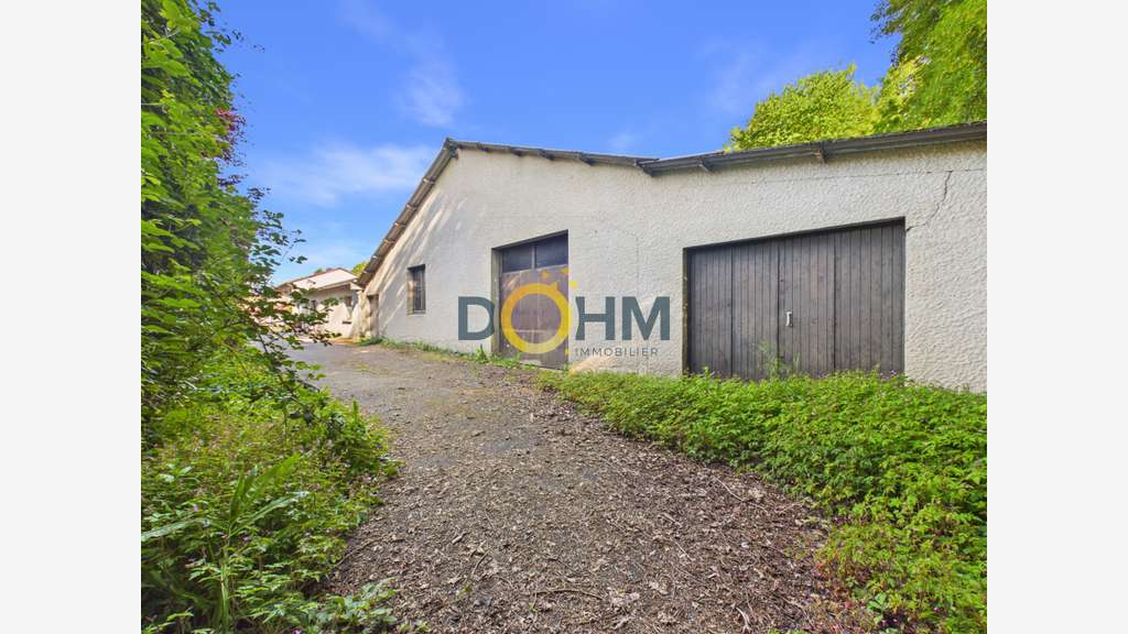 Entrepôt 458m² avec terrain constructible à Espaly