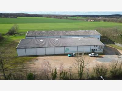 AV entrepôt avec parcelle constructible à Thiron