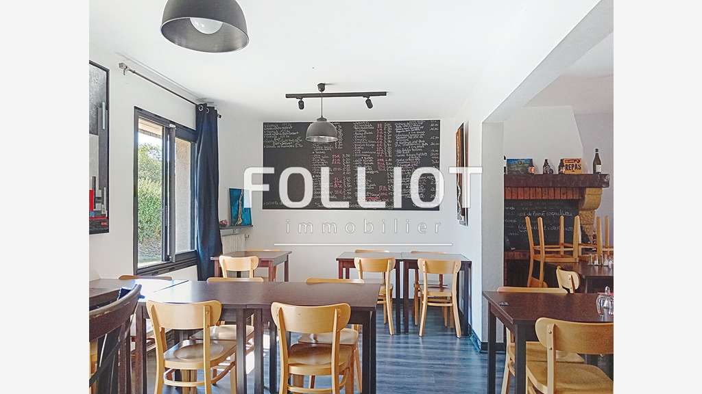 Immeuble avec restaurant et appartement à vendre 