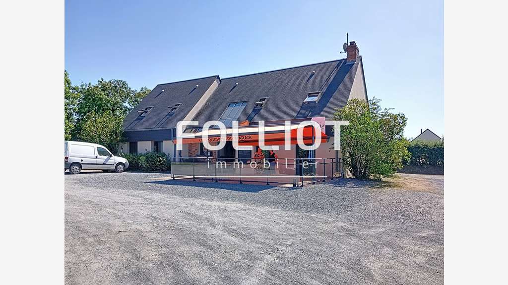 Immeuble avec restaurant et appartement à vendre 