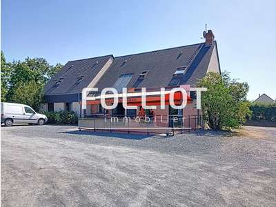 Immeuble avec restaurant et appartement à vendre 