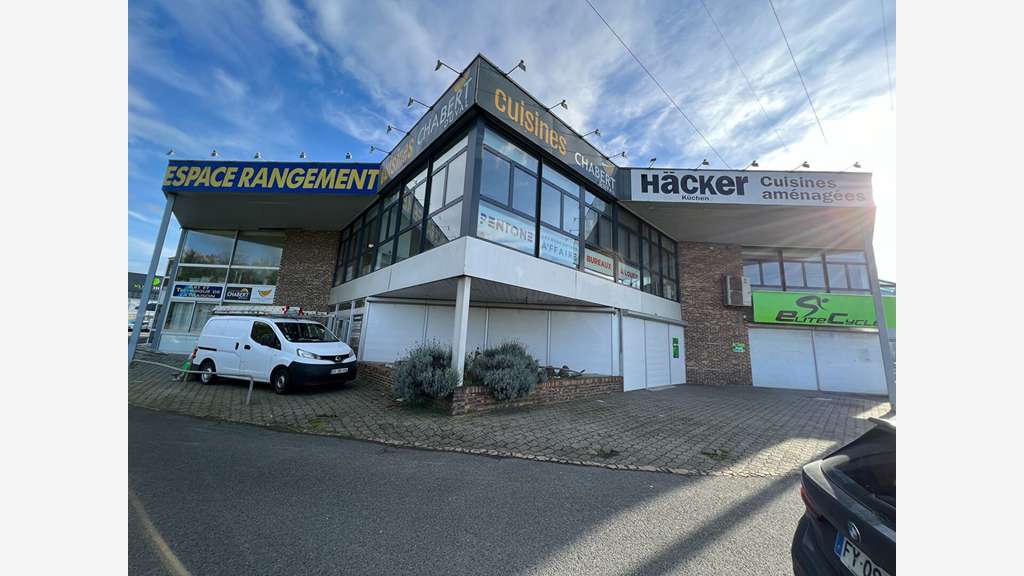 AV immeuble 564m² show room bureau dépôt Est Caen