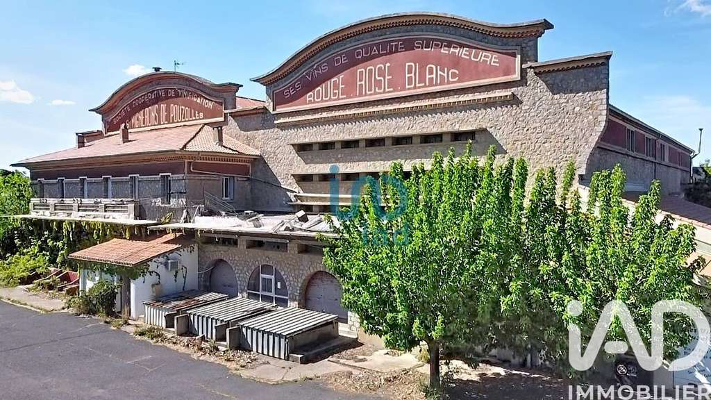 Vente ancienne cave coopérative à Pouzolles