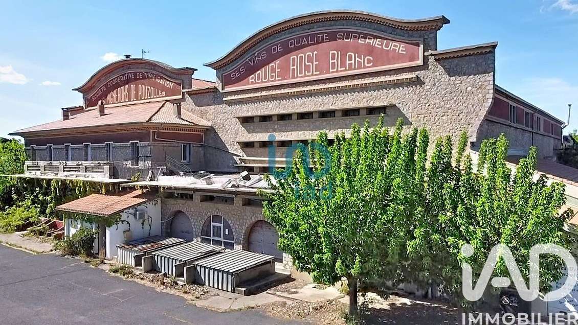 Vente ancienne cave coopérative à Pouzolles