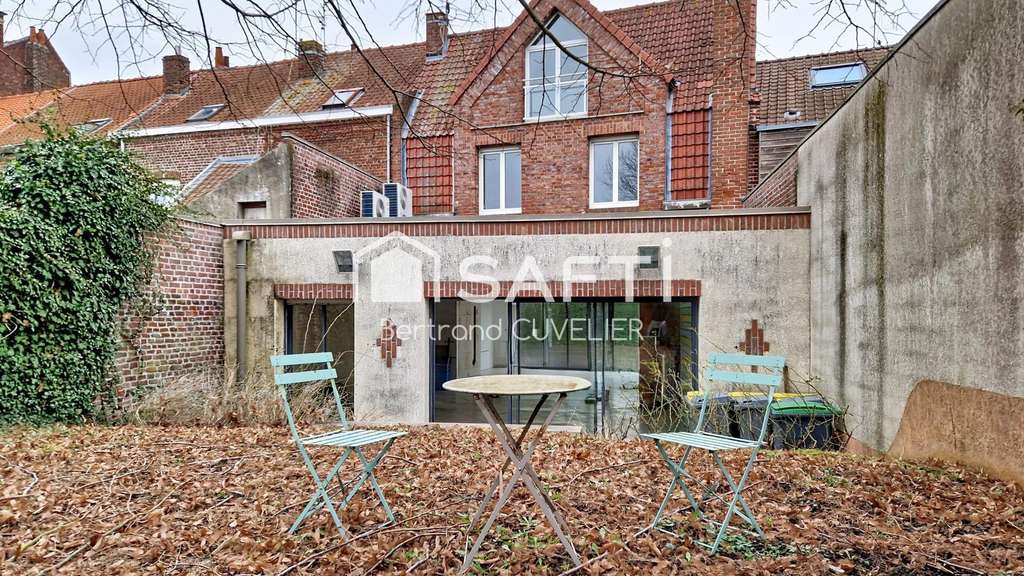 AV local commercial de 104m² avec jardin à Quesnoy
