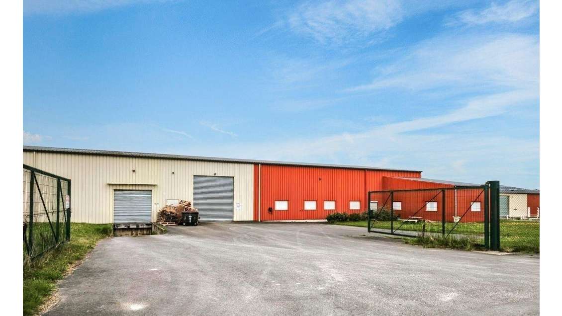 Vente entrepôt loué 6358m² ZA de Juniville