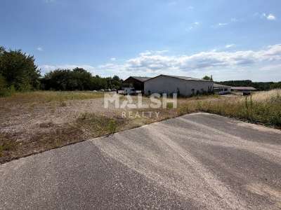 Terrain 6000m² avec local 520m² ZI Montbertrand