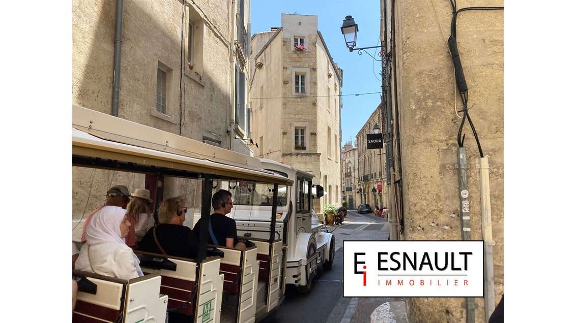 Boutique 90m² à céder Montpellier écusson