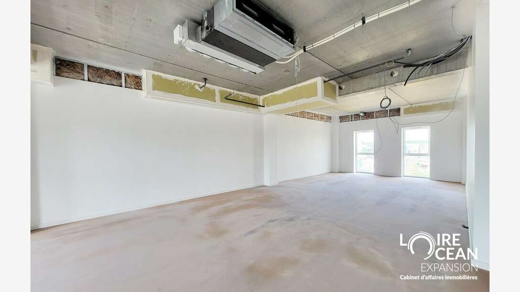 ETAGE PRIVATIF DANS IMMEUBLE NEUF