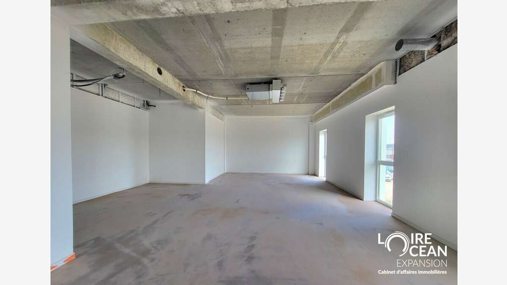 ETAGE PRIVATIF DANS IMMEUBLE NEUF