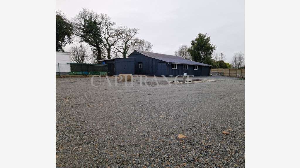 Local artisanal 140m² + Terrain 700m² Accès RN12