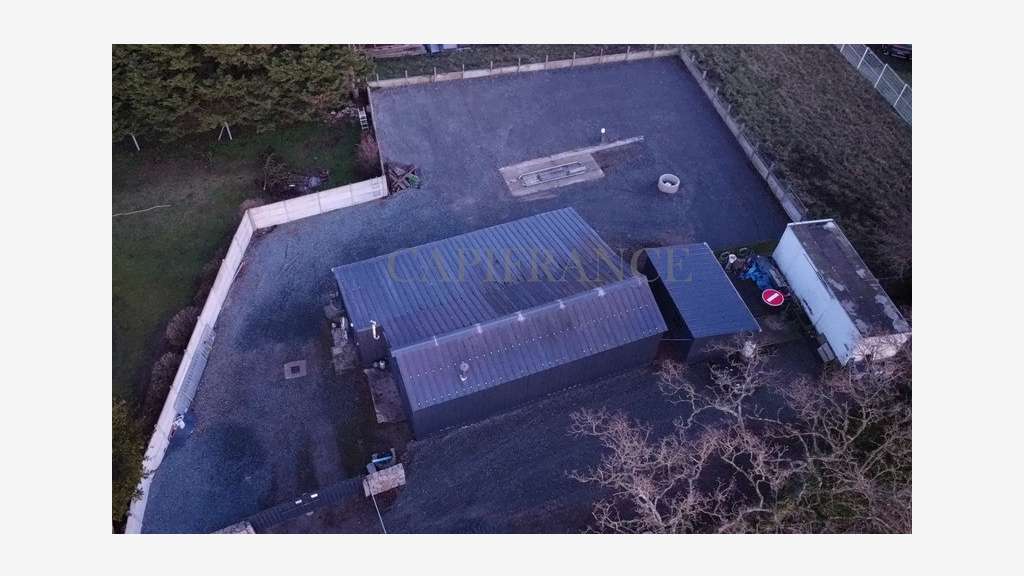 Local artisanal 140m² + Terrain 700m² Accès RN12